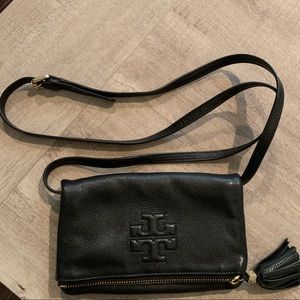 Tory Burch black fold over flap crossbody.